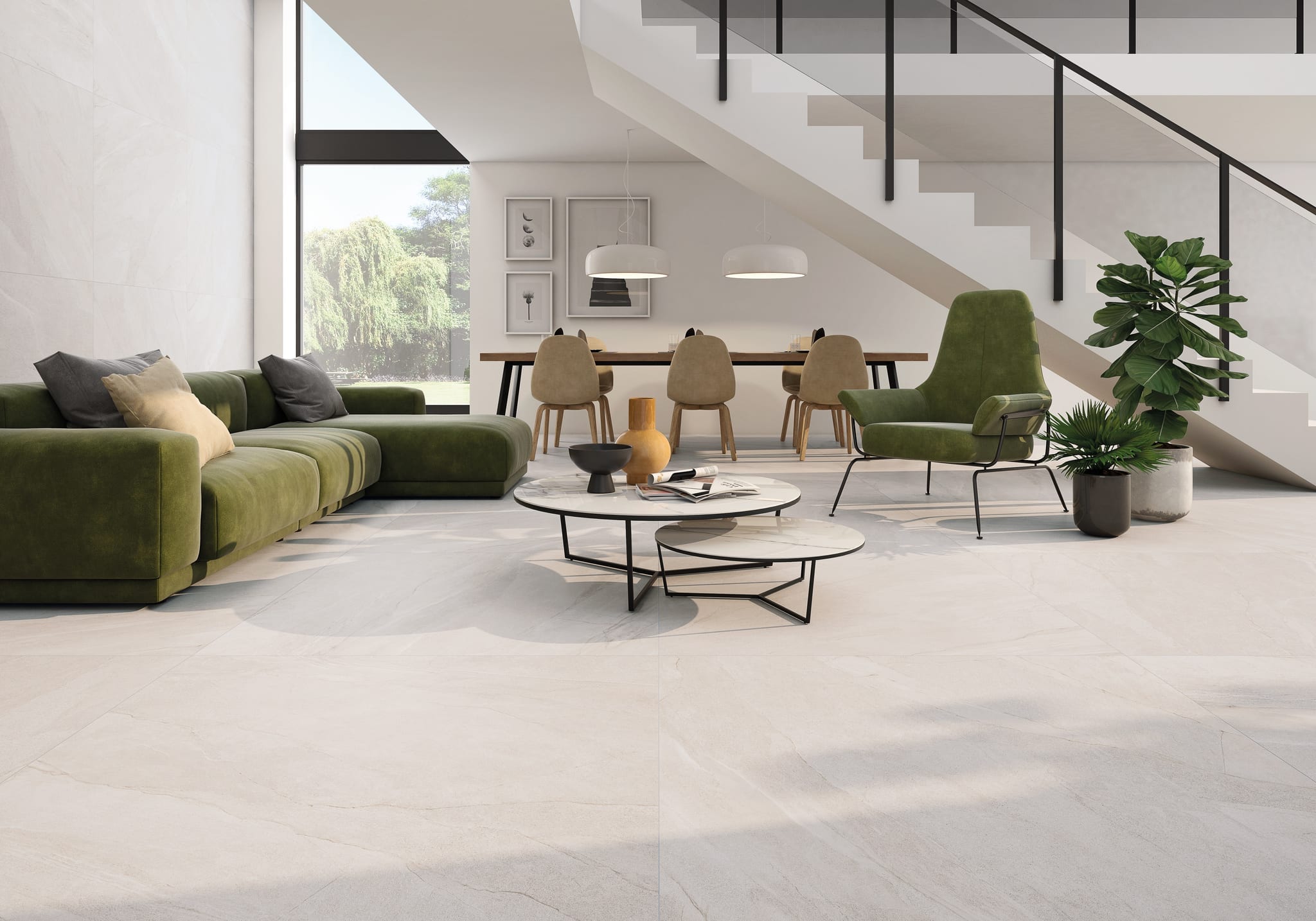 Sala abierta con porcelanato Halley Light, sofa verde y comedor — showroom A.MODO